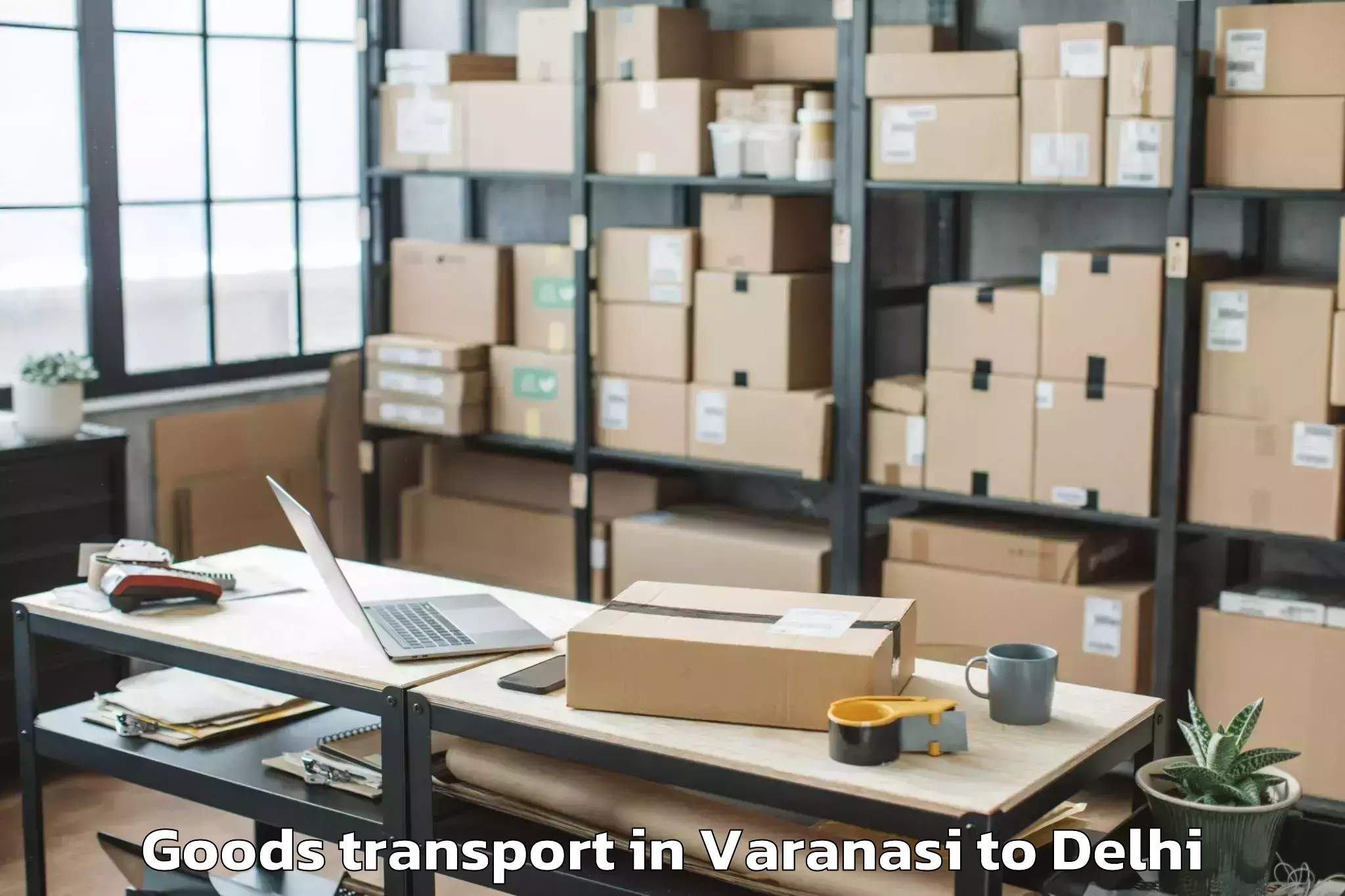 Top Varanasi to Bawana Goods Transport Available